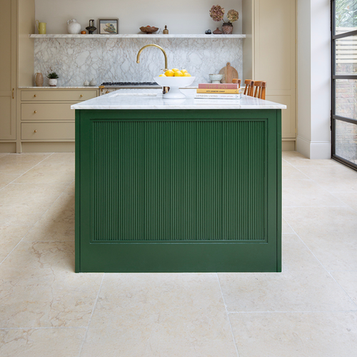 Monte Carlo tumbled limestone flooring in Kitchen with Green Island