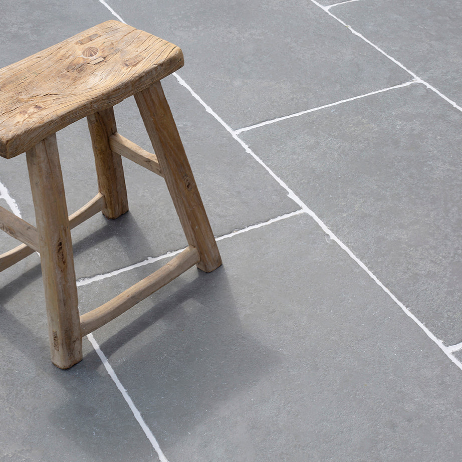 how to lay natural stone paving