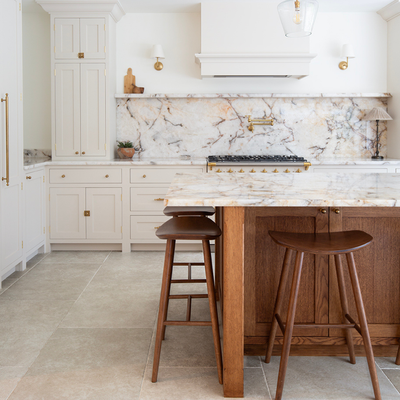 Alnwick Ivory Stone Effect Porcelain Tiles in Kitchen with White Cabinets and Wooden Island