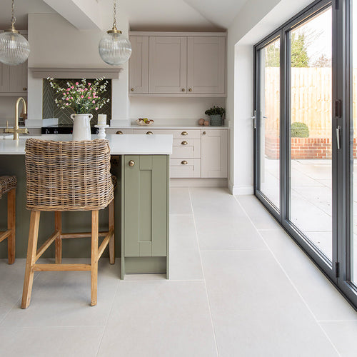 Frome Whitetiles in a kitchen with green cabinets 