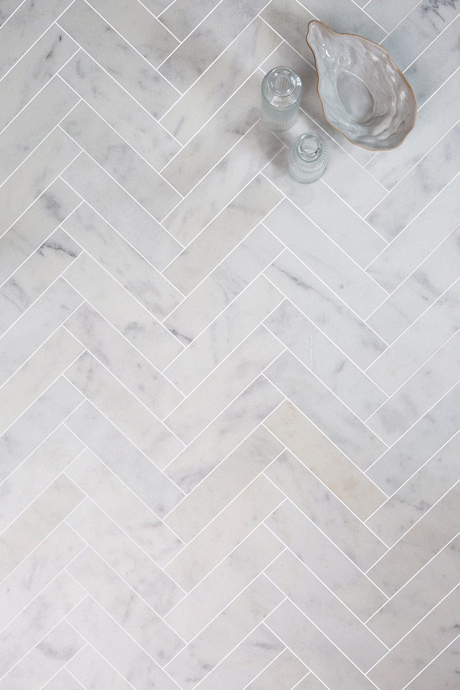 Carrara Bianco Honed Marble Herringbone Metro