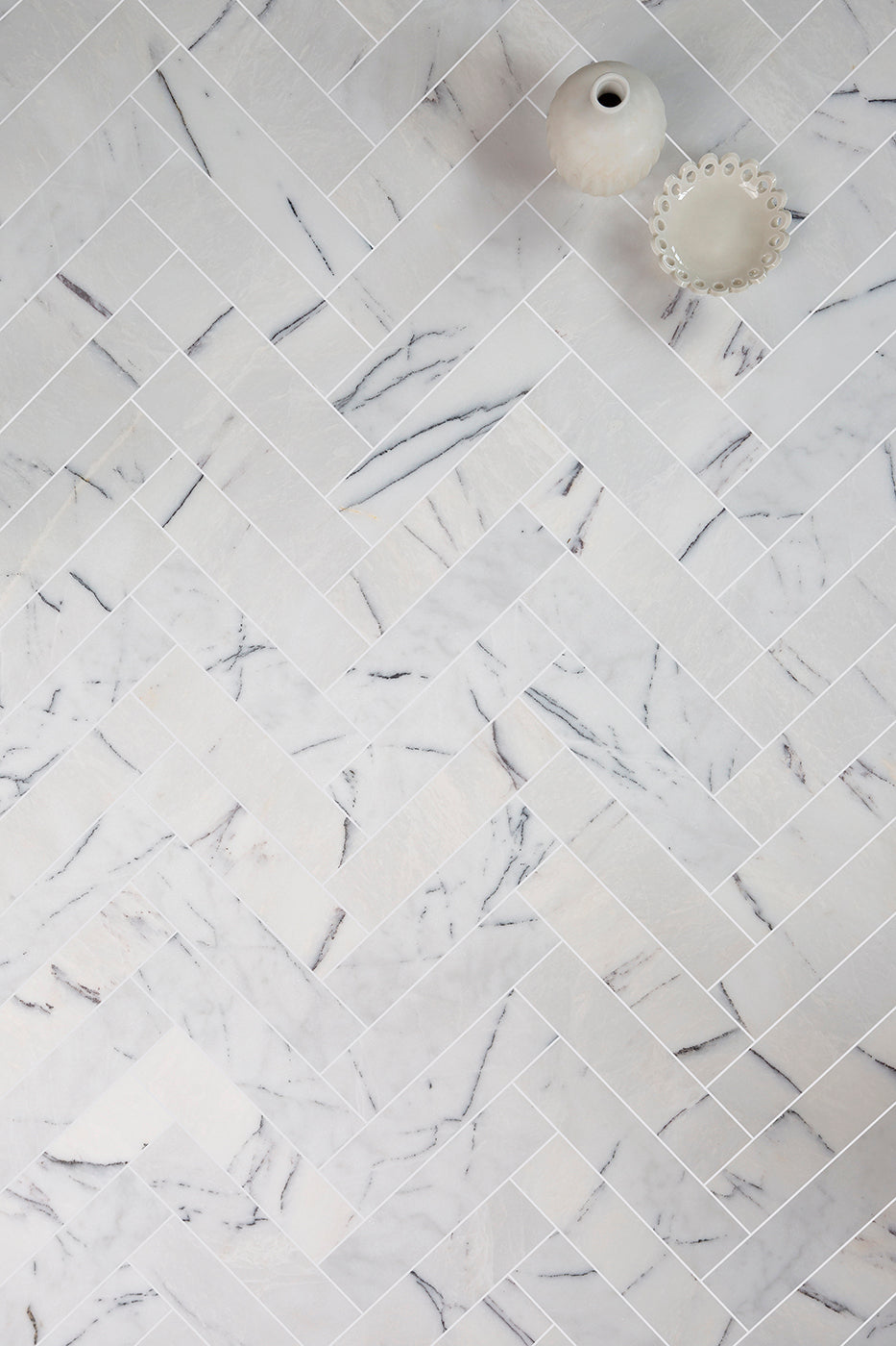 Carrara Viola Honed Marble Herringbone Metro