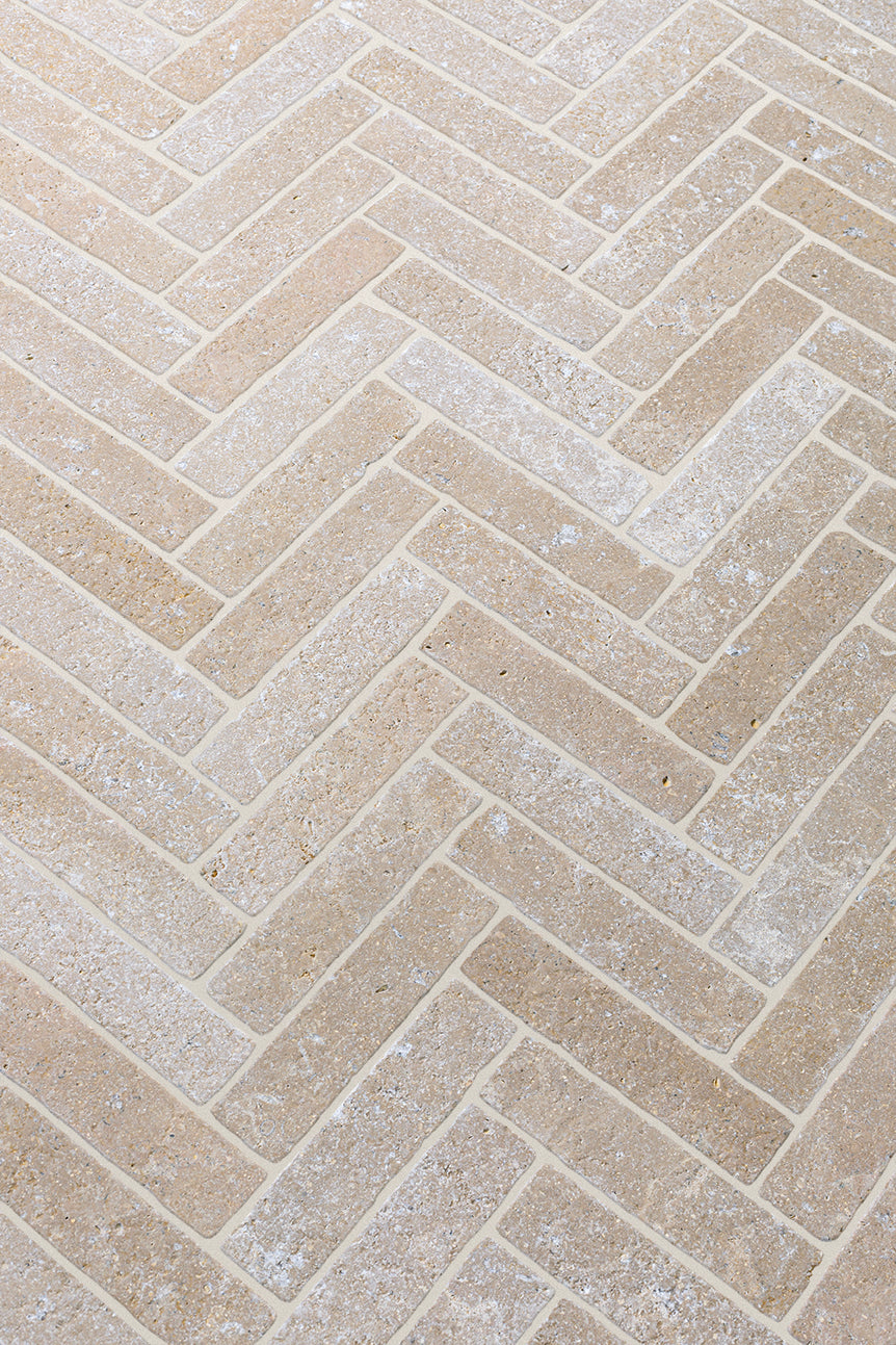 Dijon Seasoned Limestone Herringbone Tiles