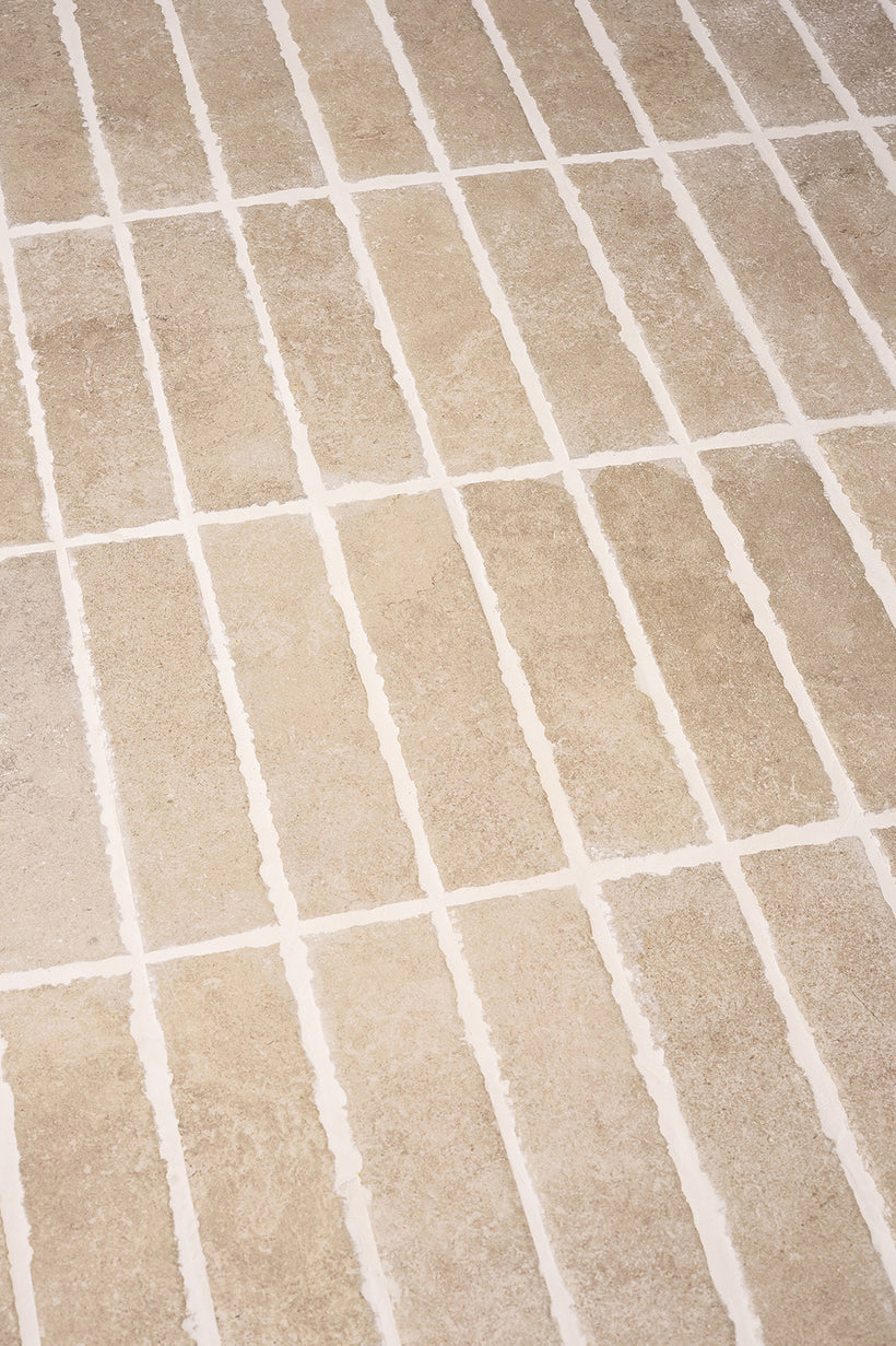 Hambleton Beige Tumbled Edge Porcelain Herringbone Cobbles