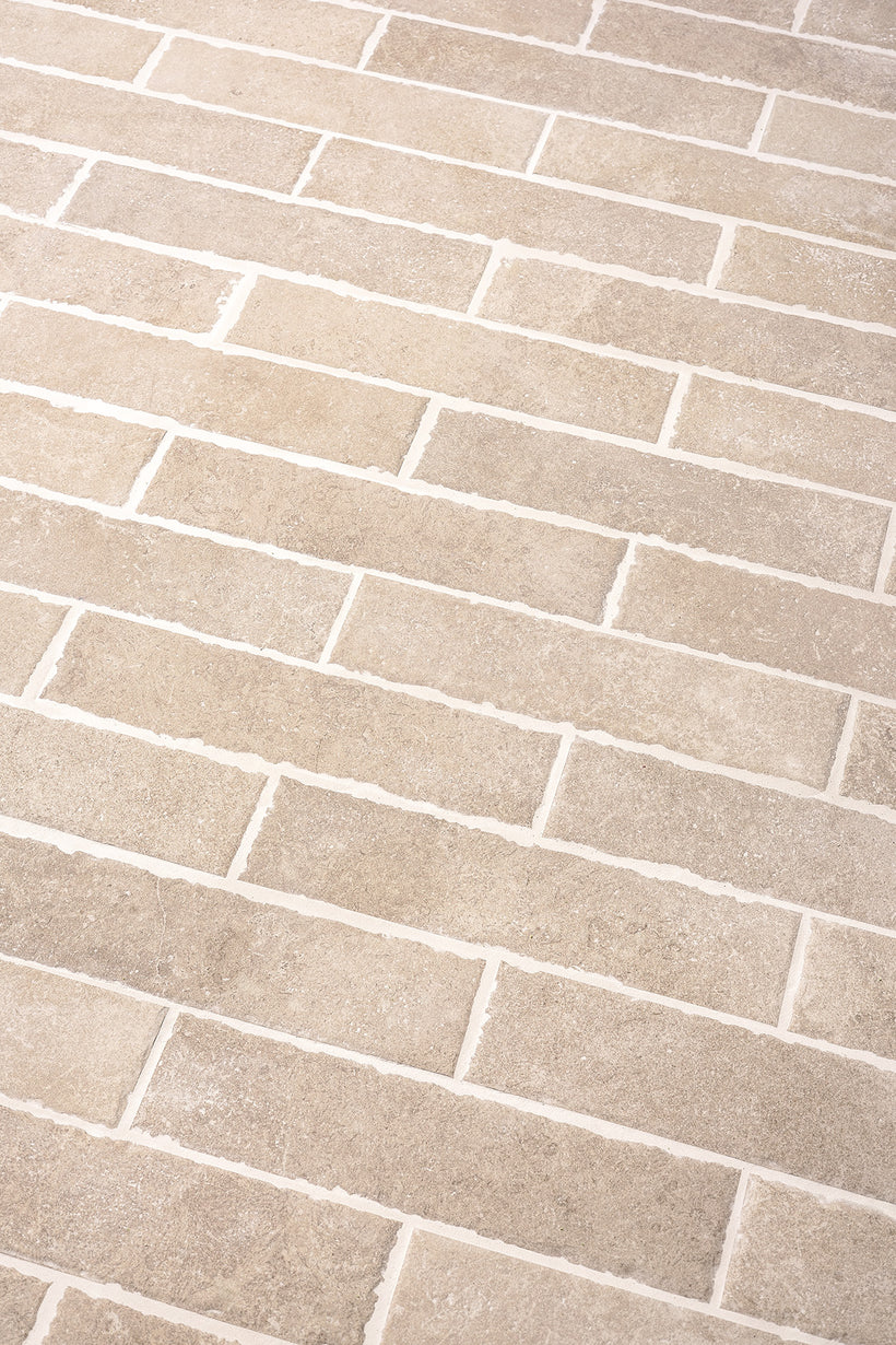 Hambleton Beige Tumbled Edge Porcelain Herringbone Cobbles
