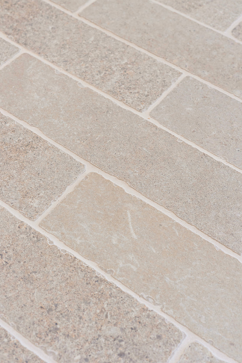 Montpellier Sable Tumbled Porcelain Herringbone Cobbles