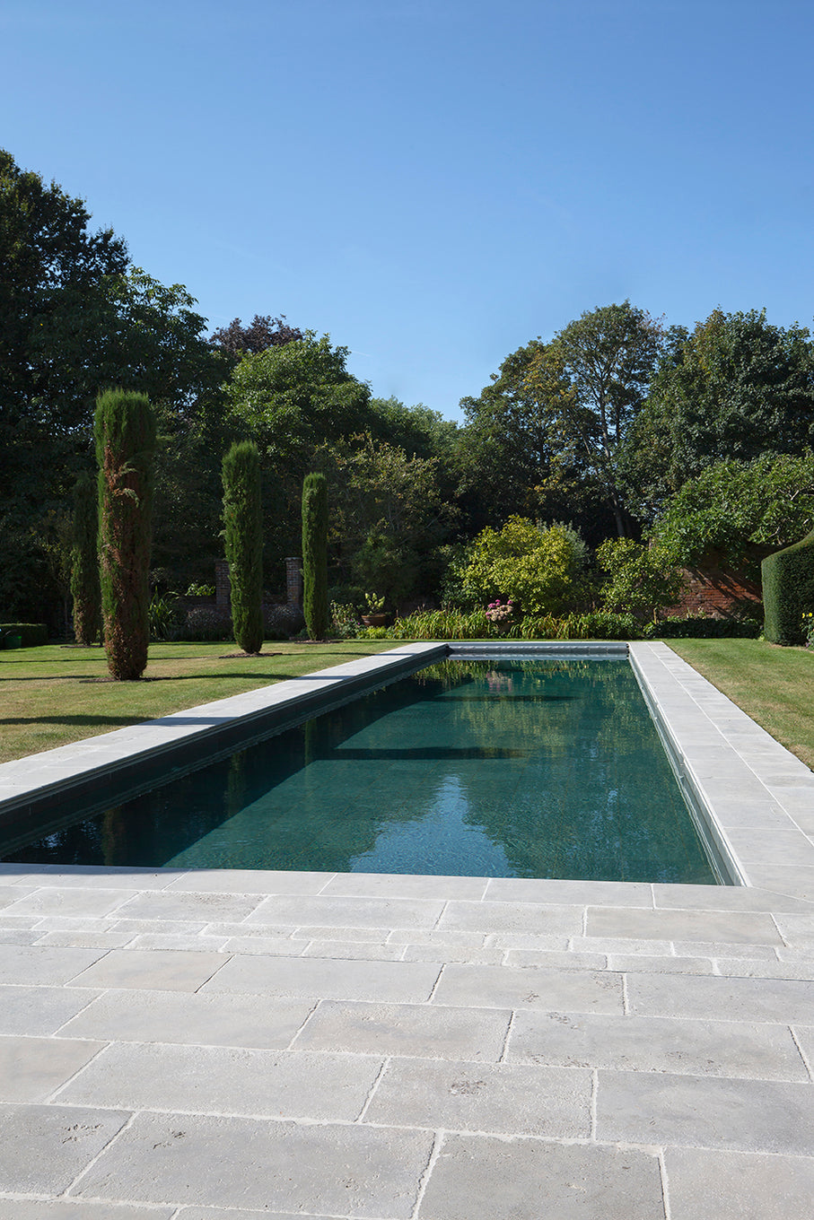 Clermont-Gris-Aged-Tumbled-Limestone-Pavers-Pool-Project-UK-Delivery